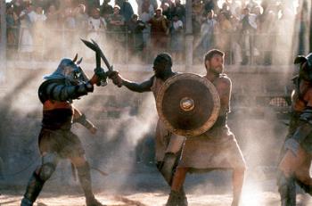 Battle scene - A picture of one of the battle scenes where the slaves/prisoners serve as entertainment for the rather cruel public. I appreciated the stark contrast between the heavily armored soldiers who were armed and the slaves who were only equipped with wooden shields. Classic example of brain over brawn cause it was due to Maximus&#039;s commanding and battle skills that allowed them to survive over and over again.