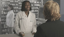 Pharmacist Functions - A picture showing a pharmacist doing its duties and functions to patients