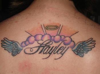 Large Tattoo - Tattoo of daughters name on back