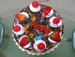 christmas cake recipes  - Chocolate Fantasy Cake 

if wrapped well, it will remain moist for a week. it also freezes beautifully for up to 3 months. ricotta cheese can be substituted for the mascarpone. 
ingredients. 
2 cups all-purpose flour 
2 cups sugar 
1 teaspoon baking soda 
1/2 teaspoon salt 
8 ounces (2 sticks) butter 
1/2 cup brewed espresso or other strong coffee 
1/2 cup orange juice 
1/4 cup plus 1 tablespoon baking cocoa 
1/2 cup mascarpone cheese, at room temperature 
2 eggs, slightly beaten 
2 teaspoons almond extract 

preheat the oven to 350ºF. grease an 8-x-2-inch round pan and set aside. In the bowl of an electric mixer, sift together the flour, sugar, baking soda, and salt. Set aside. 

in a saucepan, melt the butter. remove the pan from the heat and add the coffee, orange juice, and cocoa, stirring well to combine. Pour the butter mixture over the flour mixture. Add the cheese, eggs, and almond extract, and beat the ingredients until the batter is smooth. 

pour the batter into the pan and bake it for 35 to 45 minutes, or until a cake tester inserted into the middle comes out clean. 

let the cake cool in the pan, then carefully unmold it onto a serving plate. Serve the cake as is, or sprinkled with confectioner's sugar
 