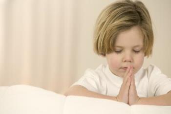 praying - child praying before going to sleep