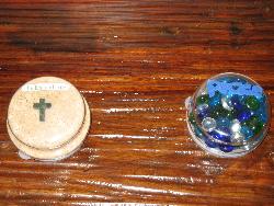 Paperweight with the cross - A paperweight I made from the top of a candle with the cross to represent Jesus Christ dying for our sins.  