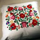Pillow - A pillow with flower design on it