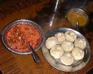 Spicy Momo - Momo with chili sauce Spicy Momo - Momo with chili sauce