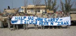 John Kerry gets mocked by soldiers in Iraq - This is a picture of a banner that some soldiers from the Minnesota National Guard made for John Kerry