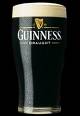 Glass of Guinness stout  - A glass of guinness stout.