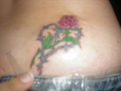 my tattoo - a rose in a heart of barbwire