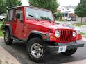 Jeep - a picture of a jeep wrangler a red one