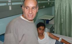 Alaa Zakout, with his father, says that he is bore - Alaa Zakout, with his father, says that he is bored of life in Gaza and wants to die (Stephen Farrell)