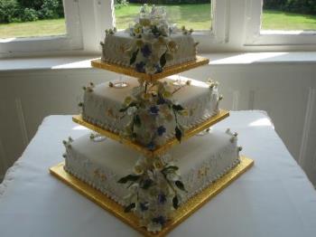 Wedding Cake... S & P - Shelley and Phil&#039;s Wedding Cake on the table at Highleigh Manor.