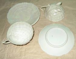 cups and saucers - have only a number on bottom and a silver mark on one saucer.  