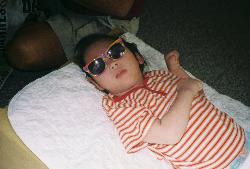 One of my favorite! - My daughter with her first sunglasses!