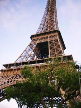 Eiffel Tower - It was the tallest building in the world at that time. People wanted to tear it down sometime afterwards - but kept it once they learned it made a good radio antenna! It is ranked as one of the wonders in the world.