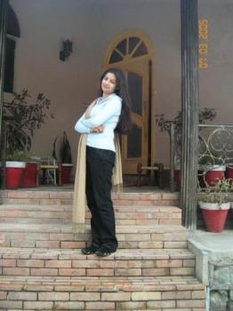 Yousra - Picture of my wife standing infront of the hut we stayed in on our trip to Murree which is a hill station near Islamabad the capital of Pakistan