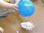 static balloon - friction of the balloon will cause the static electricity to form and cause the attraction factor