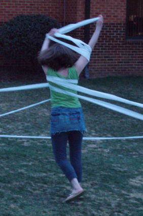 Me dancing in toliet paper - I did this after Georgia Mason made it to the final four for basketball.  The entire campus broke out in this crazy celebration... cars honking, riding around in cars screaming, and toliet paper all over.