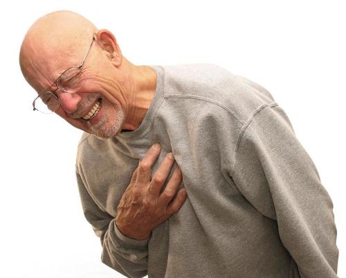 heart attack - man having a heart attack