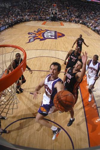 Lay-up by Phoenix Suns Steve Nash - Steve Nash (13) of the Phoenix Suns drives for a layup against the Miami Heat in a NBA game played at US Airways Center January 5, 2007 in Phoenix Arizona. (Photo by Andrew Berstein/NBAE via Getty Images)