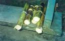 sugar cane - a photo of cut sugar canes. i love sipping the sweetness from it when i was younger.  source link: http://www.calibercreations.com/pisin/images/sugar_cane_ENB3.jpg