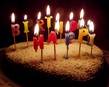 cake - A cake with lighted candles
