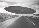 Flying saucers - A flying saucer which is approaching the earth