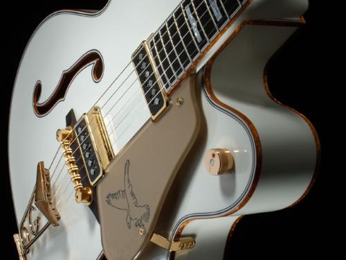Gretsch White Falcon - When this guitar was first released back in the mid 50's it was the most expensive guitar in the world.  If you were to find an original these days it would be worth a serious amount, but since Gretsch make them pretty close to the originals, as in the pic, you can get one a lot cheaper.