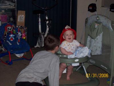 My little fireman! - My oldest put his fireman hat on the youngest...so cute!!!