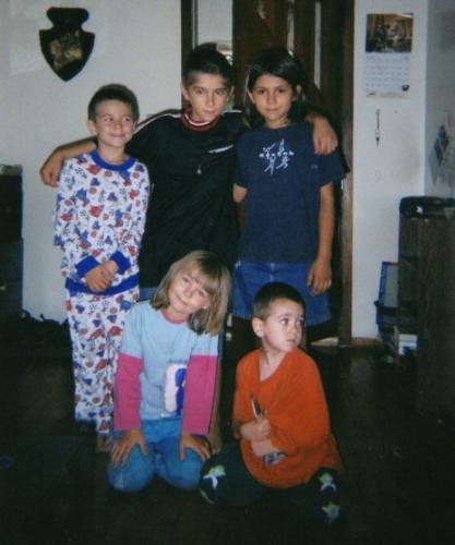 My kids - Here ya go, a pic of all 5 of my rugrats at once. These are my sarcastic procreations ... :) (Top left - Justice, Warren, Raeanne. Bottom left - Jennifer & Joshua)