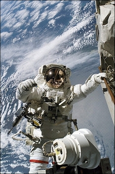 fixing solar panels - crew working on the ISS