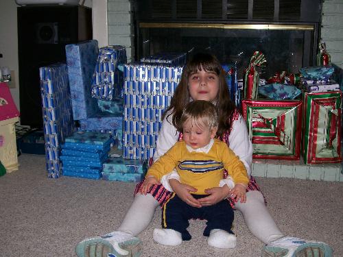 Here re my Children - Here are my children sitting on the floor in my family room