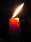 A Candle in the Wind - image of a candle whose flame appears to be blowing in wind to illustrate the song by Elton John sung at Princess Diana's funeral--A Candle in the Wind A Candle in the Wind - image of a candle whose flame appears to be blowing in wind to illustrate the song by Elton John sung at Princess Diana's funeral--A Candle in the Wind