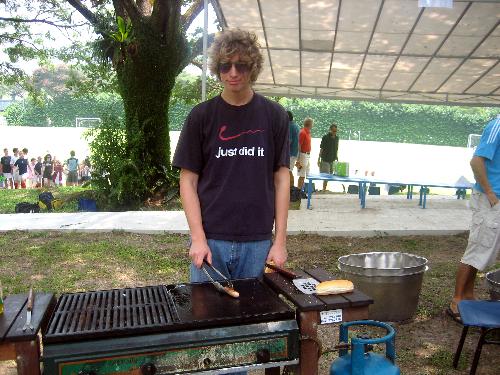 My Cooking Skills! - This is a photo of me cooking up a storm for a charity drive to help get the kids in Honduras of the streets.. this was actually taken when there was but one hotdog left and it was reserved for me =)