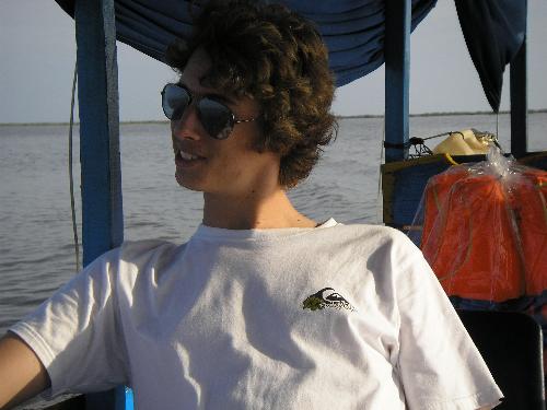 In a little boat with a pair of stunning Aviators! - I am honestly not the person that poses.. that much! Haha this one is of me starring into the sun setting under the horizon.. anyone who hasn't visited Cambodia seriously needs to consider it!