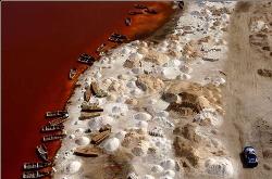 Red Sea - Sea red with the iodine in the salt, salt heaps Red Sea - Sea red with the iodine in the salt, salt heaps