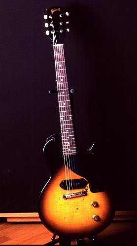 Wooden Gibson lespaul - This is one of the best guitars of the world.Gibson with mapple neck.It got a very soft tone.It got a whammy touch.It is used mostly in metals.Used by most of the best guitarist.