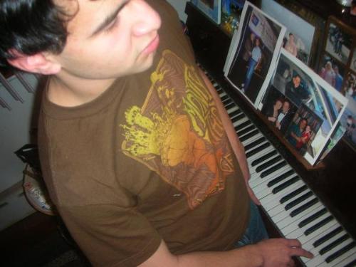 Scott and Piano - Here is a picture of me and a piano. I did not know this picture was being taken