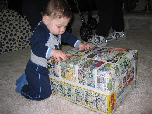 evan opening a present - evan opening a present
