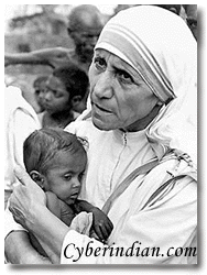 Mother teresa - Mother teresa holding a child