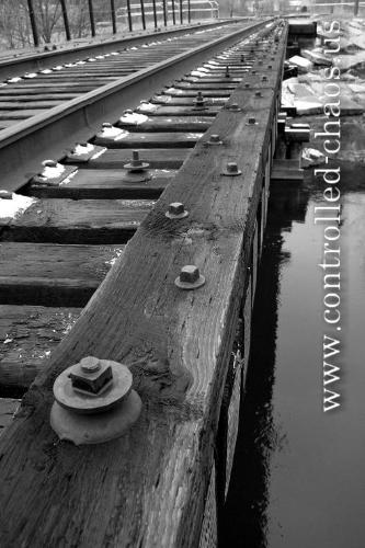 Rail Road - BW photo of a railroad bridge in Mount Pleasant, Michigan.
