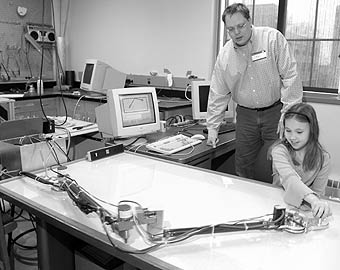 Work more - this is the picture of working people working more to get the job done and this person has invloved his daughter with him to finish the work as early as possible.