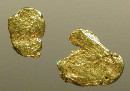 Gold Piece - Gold is highly sought-after precious metal that for many centuries has been used as money, a store of value and in jewellery. The metal occurs as nuggets or grains in rocks and in alluvial deposits and is one of the coinage metals. It is a soft, shiny, yellow dense, malleable, and ductile (trivalent and univalent) transition metal. Modern industrial uses include dentistry and electronics. Gold forms the basis for a monetary standard used by the International Monetary Fund (IMF) and THE BANK OF INTERNATIONAL SETTLEMENTS its ISO currency code is XAU.