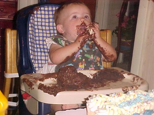 Yummy Chocolate Cake - Kirsten enjoying her 1st Birthday.