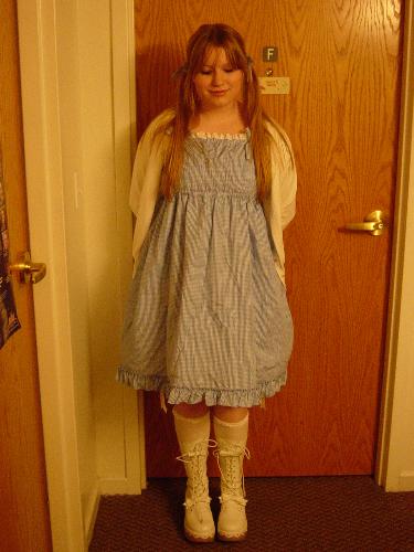 Impromptu Lolita - Please forgive the lack of a blouse!  Last Wednesday, I decided that I was going to hang out with friends wearing Gothic Lolita, a Japanese fashion style.  What I'm wearing: Jsk--Metamorphose Temps de Fille Socks--Baby, the Stars Shine Bright Bloomers--Metamorphose Temps de Fille Boots--Montreal (Angelic Pretty knock-offs)