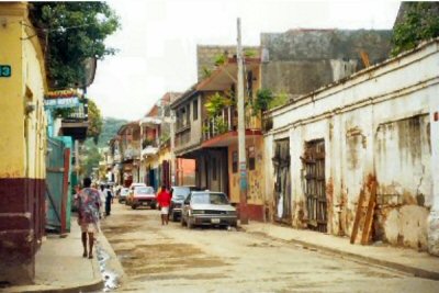 Cap Haitian street - This is a street in Cap Haitian, Haiti.  Usually there are more people walking in the streets.  Cap Haitian is the second largest city in Haiti.  It is usually listed as having 50,000 residents, but it is probably more like 70,000 in an area that would serve 10,000 people in the USA.  Cap Haitian was called the Paris of the Western world in the late 1700s, and was the capital of the northern kingdom of Haiti during the reign of King Henri Christophe