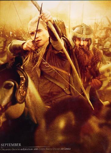 Legolas - Legolas and Gimli on a horseback.

From the movie Lord of the Rings ( Two towers or Return of the King.