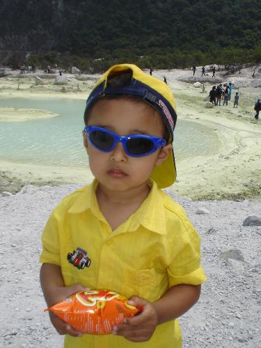 rifqi on kawah putih - The image take on September 5th,2005.  He is my child Rifqi in him style on 'Kawah Putih' tourism area, southern of Bandung West Java.    (Kawah putih mean white kaldera).