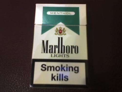 Marlboro Menthol - A Pack of Marlboro Menthol purchased from the airport duty free shop with a 'Smoking Kills' sign on the front of the pack. Marlboro Menthol is made under the Authority of Philip Morries Products, S.A. and is a variance of the Marlboro brand. It's background is dark green in color. It is to be noted that Marlboro Menthol Lights is light green in color, very similar and should not be confused.