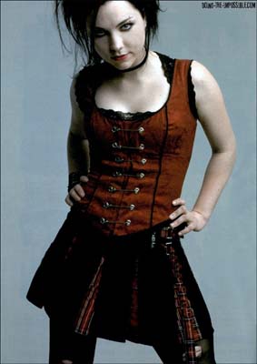 amy lee - Amy Lee wearing a red gothic victorian costume.