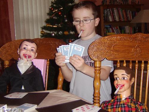 ventriloquist dolls - these are the ventrioloquist dolls my daughter nicole got for christmas , i had to search ebay fot them and wait ages until they came from america but they re loving it over here in ireland. as you can see theyre enjoying a game  of poker with my son callum , haha.dont worry , he didnt light the cigarette , it was just for fun .