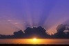 Sunset  - Beautiful sunset within clouds. Signifies the end of a day and is the lead in to a new day with new beginnings!